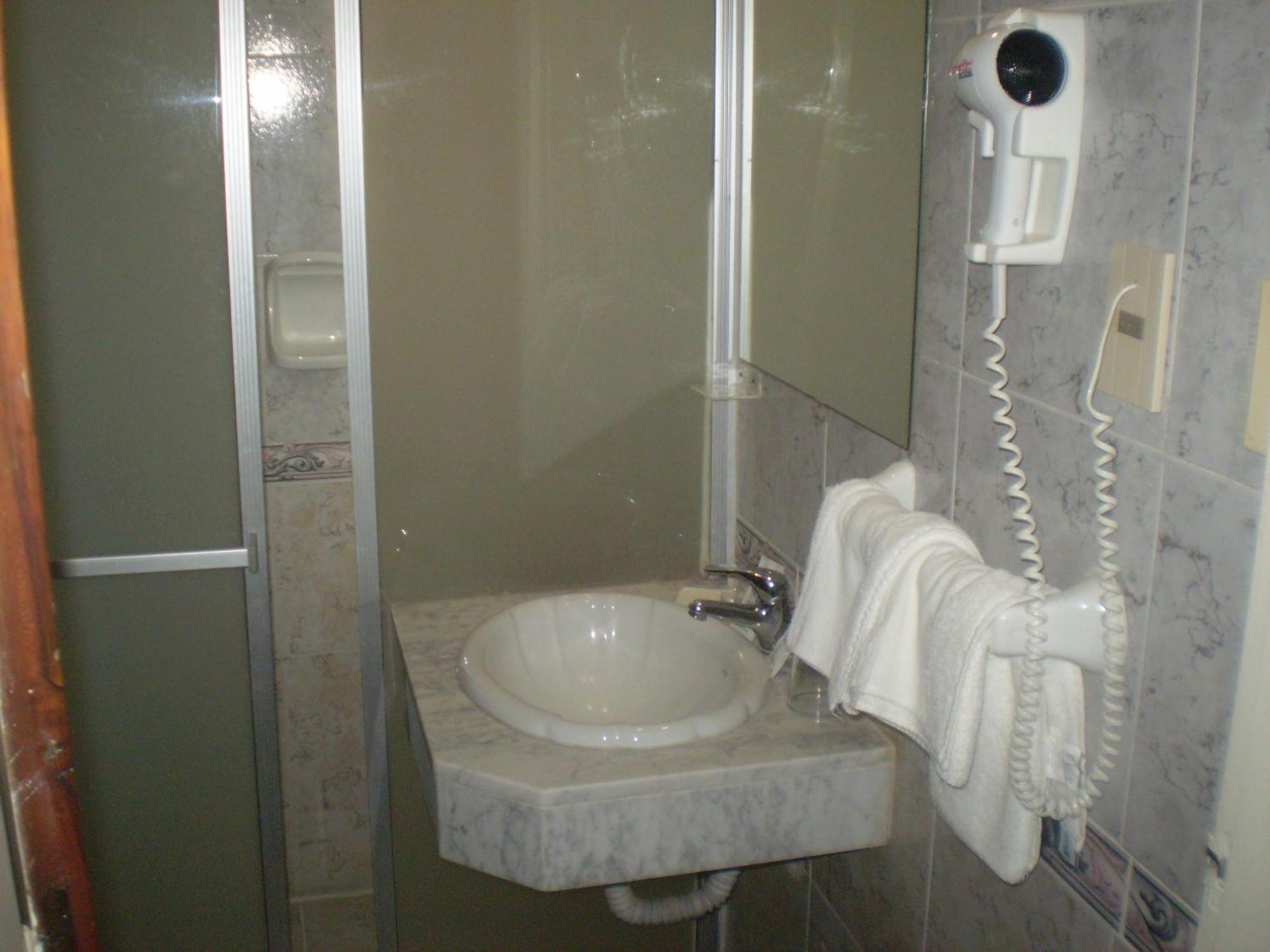 Hotel Centenario Atlántida Quarto foto